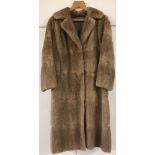 A vintage ladies 3/4 length bespoke made pale fur coat, fully lined.