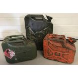 3 vintage jerry cans. A 20 litre can together with 2 10 litre cans.