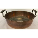 A Victorian copper preserve pan.