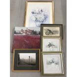 A collection of modern framed and glazed prints.
