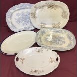 A collection of 5 vintage ceramic meat platters to include blue and white & floral pattern.