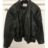 A vintage black leather "Dynamic Leathers" bikers jacket.
