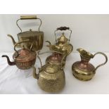 6 large brass and copper ware items; 4 teapots together with a pair of jugs.