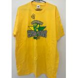 A Norwich City FC league one champions yellow T shirt signed by player Michael Spillane.