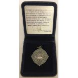 A Michelin Tyres PLC boxed medal to commemorate The company's diamond jubilee of production.