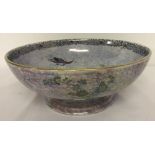 A Wilton ware lustre bowl with crane design in blue and lilac colouration.
