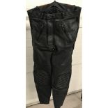 A pair of "stein" black leather motorcycle trousers.