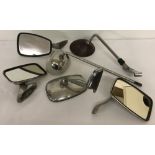 A collection of 6 chrome classic car and motorcycle wing mirrors.