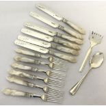 A set of 6 carved mother of pearl handled vintage silver plate knives and forks.