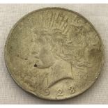 A 1923 American silver peace dollar. Philadelphia mint