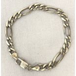 A silver Figaro design bracelet with lobster clasp.