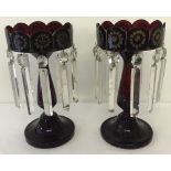A pair of Victorian Cranberry/Ruby coloured glass lustres.
