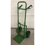 Set of green metal Sack Wheels with Pneumatic Tyres.