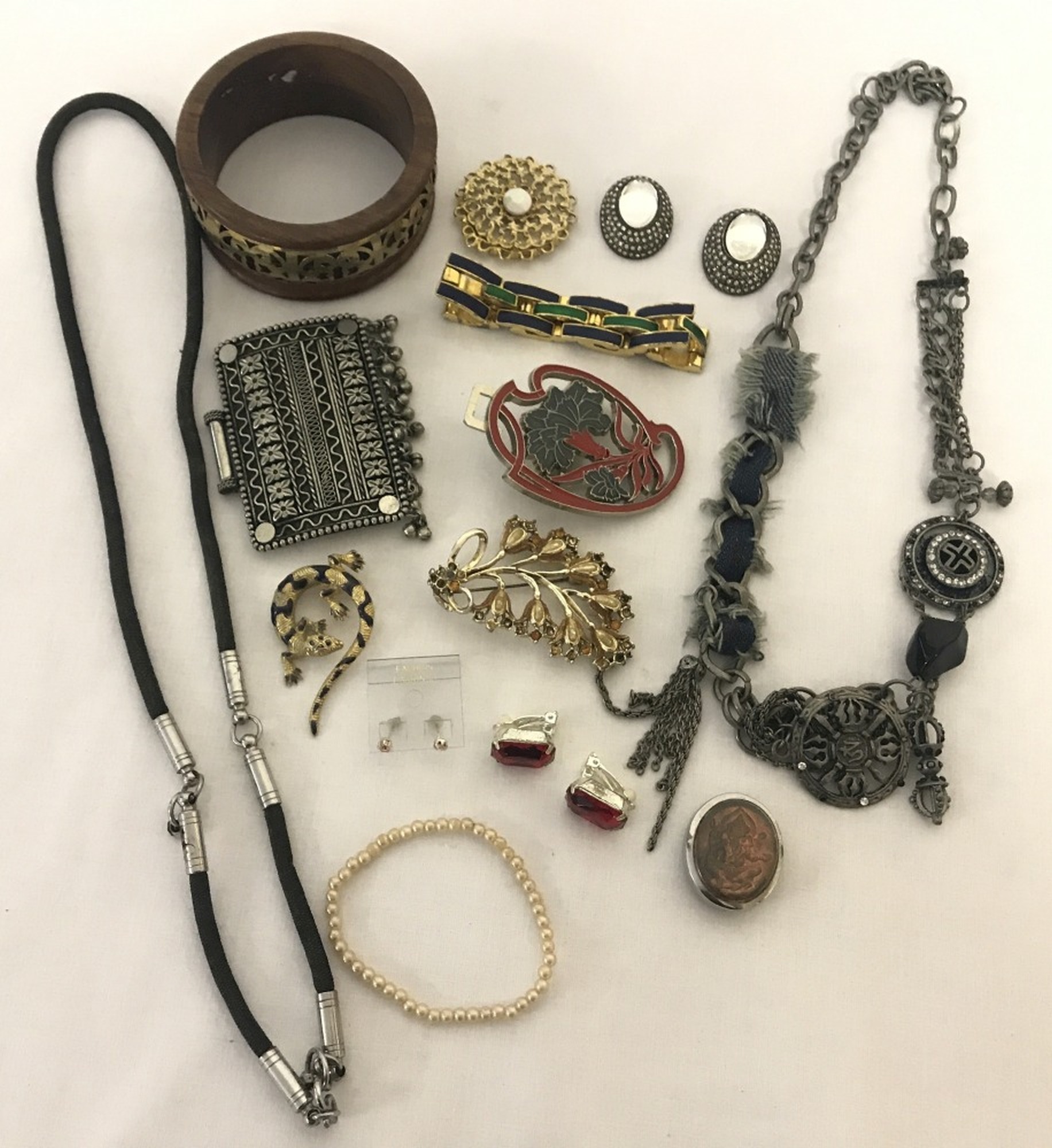 A small quantity of costume jewellery to include clip on earrings and bracelets.