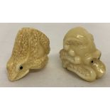 2 unusual carved rings in the shape of animals, possibly bone.