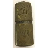 A WWI trench art lighter with initials GP to lid and 1919 engraved to case.