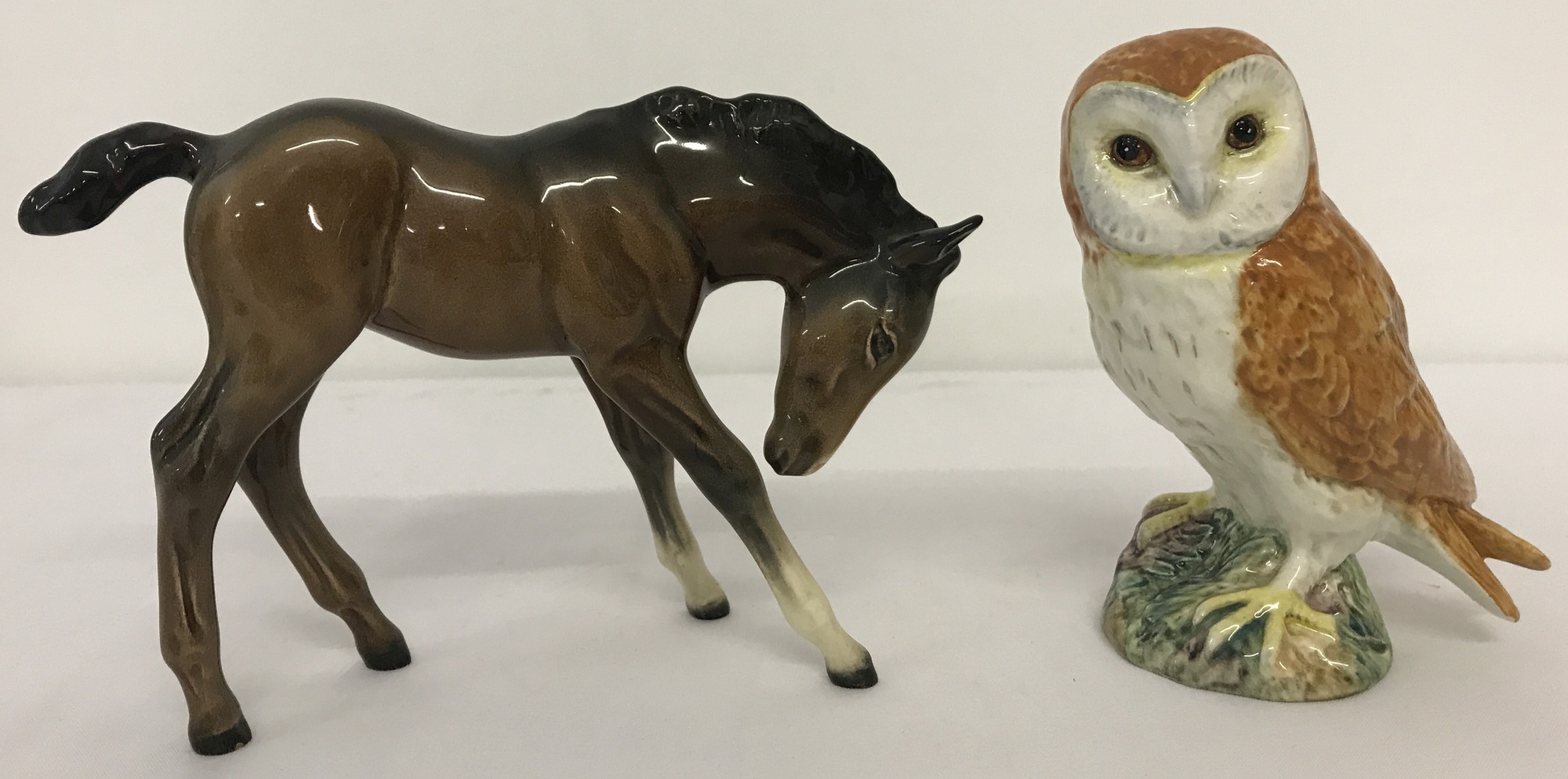 2 Beswick ceramic animal figurines.