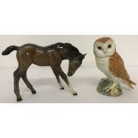 2 Beswick ceramic animal figurines.