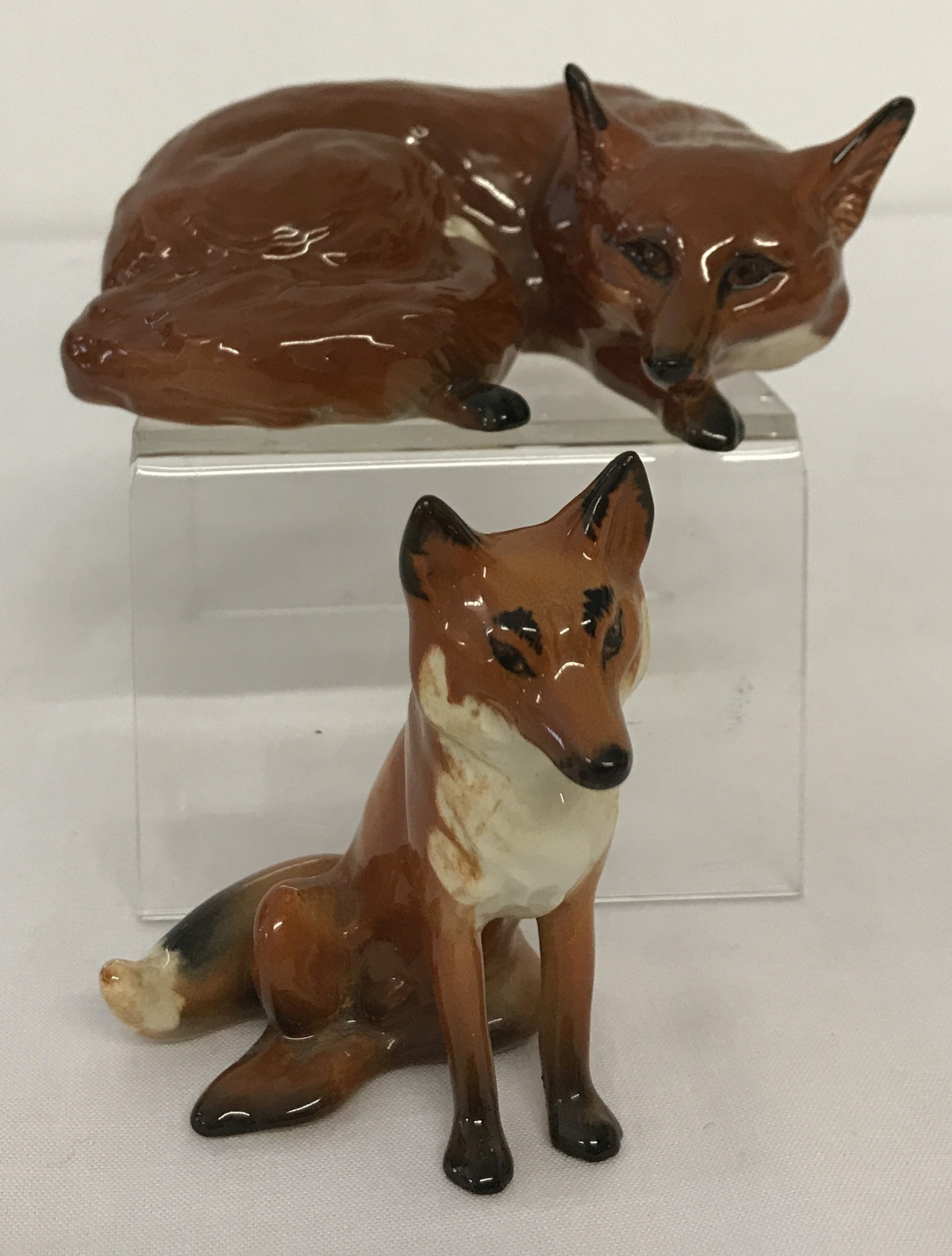 2 Beswick ceramic foxes in gloss finish.