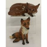 2 Beswick ceramic foxes in gloss finish.