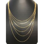 A multi graduating strand silver gilt fine curb chain necklace.