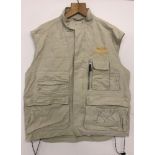 A Breitling "Instruments For Professionals" beige canvas sleeveless utility jacket by clique.