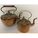 2 vintage copper kettles, one dented.