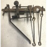 A vintage set of metal Steelyard weighing scales complete with weighing hooks.