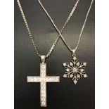 A 925 silver snowflake pendant set with small round cut diamonds on an 18" fine box chain.