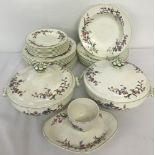 A vintage Wedgwood part dinner service in a floral pattern.