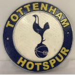 A modern, painted Tottenham Hotspur, circular shaped, wall hanging plaque.