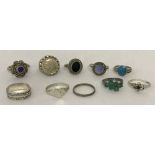 A collection of 10 silver and white metal dress and band rings.