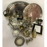 A collection of silver-plated and metal items.