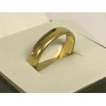 A vintage 22ct gold wedding band.