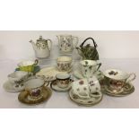A collection of 9 teacups and saucers and coffee cans and saucers.