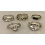 5 silver dress rings.