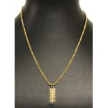 A 9ct gold rope chain with ingot style pendant.