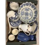 A collection of vintage mixed blue & white ceramics.