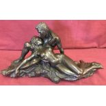 A heavy bronzed metal figurine of lovers, dated 2005 to reverse.