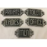 5 Art Deco style cast iron door plaques.