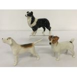 3 small Beswick dog figurines.