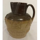 A large Doulton Lambeth harvest style jug.