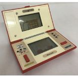 A vintage Nintendo multi screen Mickey & Donald handheld electronic game.