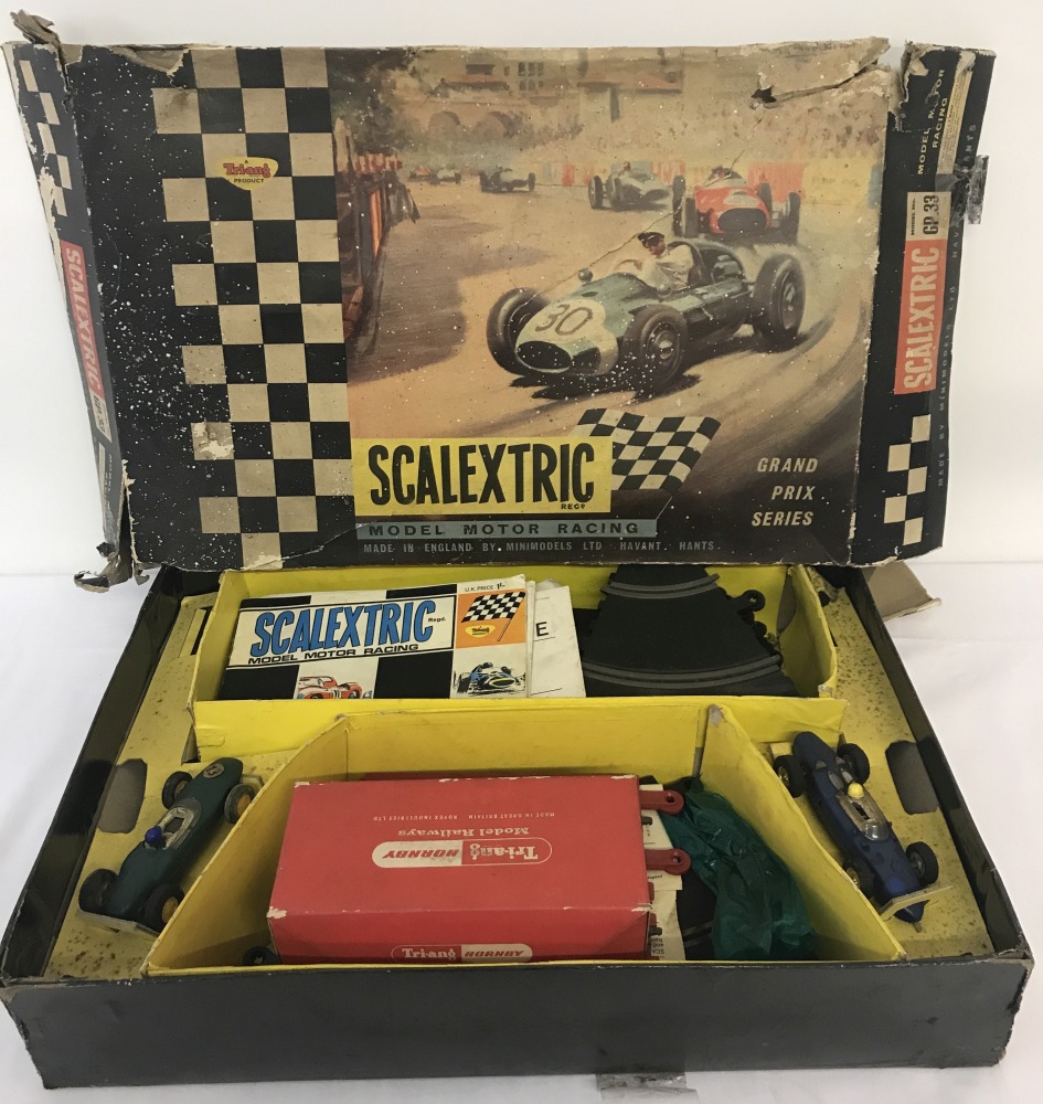 A 1960's Triang Scalextric GP 33 boxed set complete with cars and booklet.