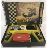 A 1960's Triang Scalextric GP 33 boxed set complete with cars and booklet.