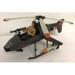 A 1980's Coleco Rambo Force Of Freedom Skyfire assault copter with 2 missiles.