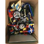 A box of mixed Lego pieces and bricks to include Technics, base platforms and wheels.