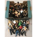 A box of 30 assorted 1999 & 2000 Jakks Pacific, Titan Tron Live, jointed poseable wrestling figures.