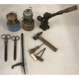 A collection of assorted vintage tools.