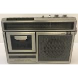 A vintage Panasonic Radio/cassette recorder in silver. Model RX-1450LE.